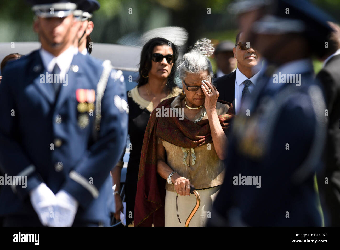 Nola Whitfield, wife of 2nd Lt. Malvin G. Whitfield, awaits the arrival ...