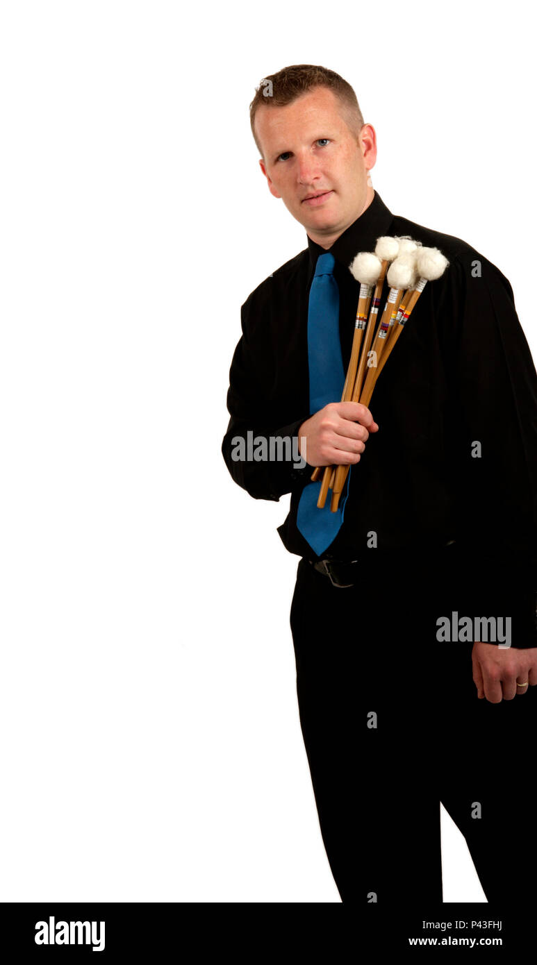 percussionist holding sticks Stock Photo