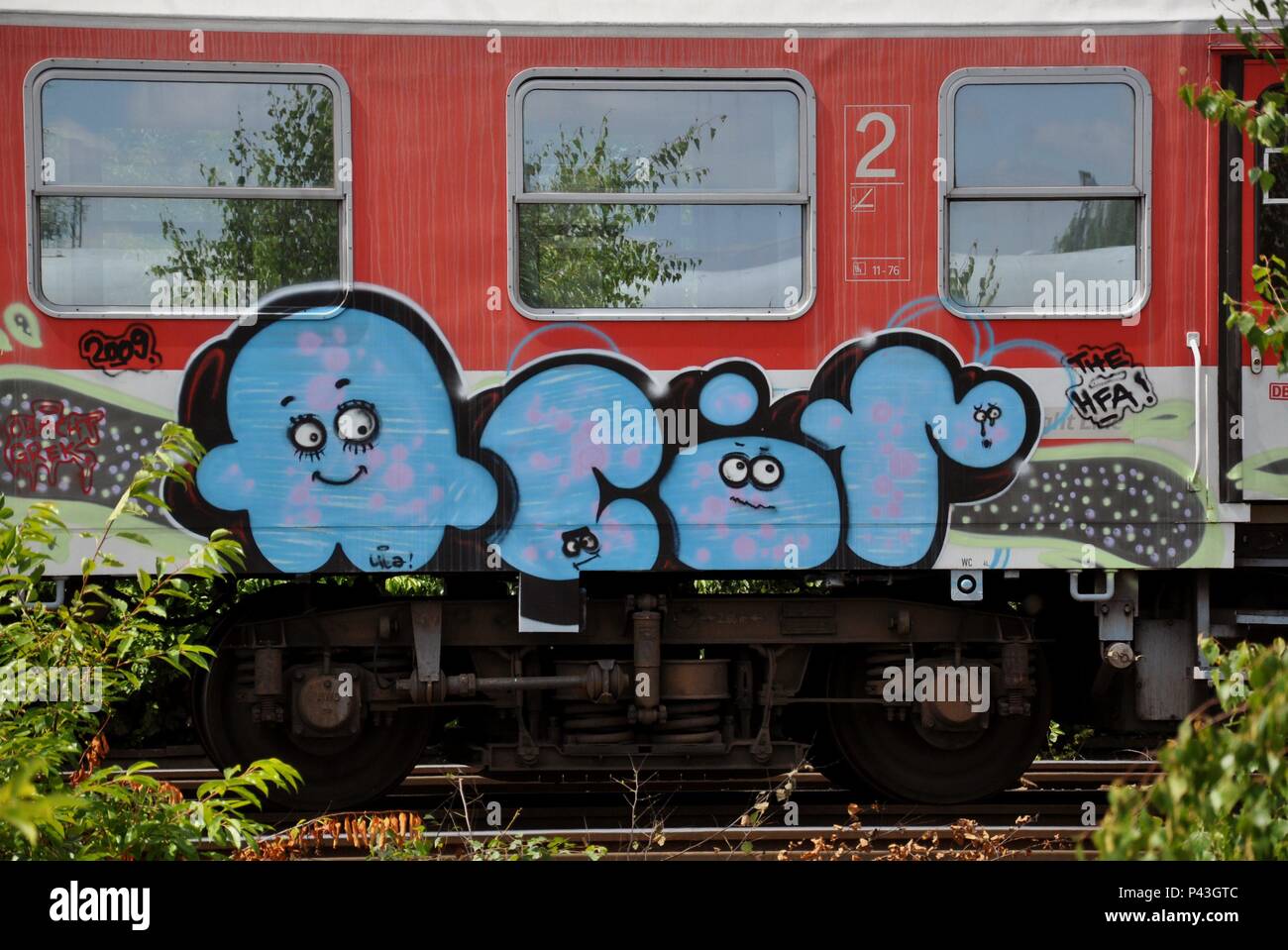 Graffiti on passenger train on 22.07.2012 in Hamm - Germany. | usage worldwide Stock Photo