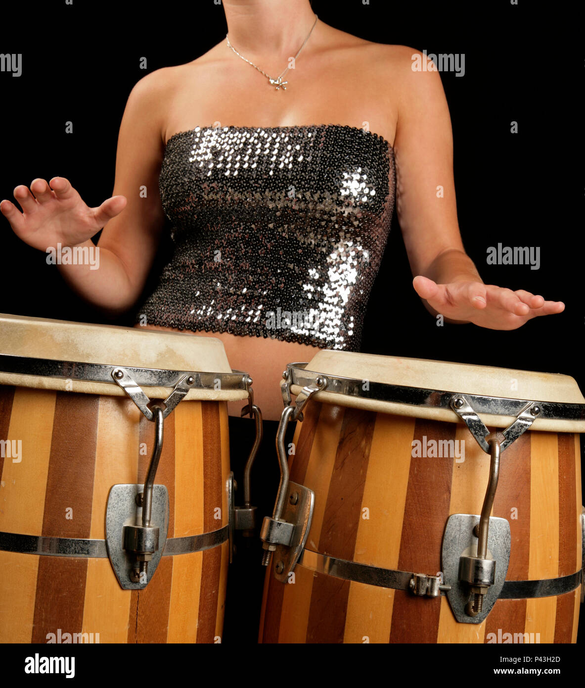 Young woman playing congas in a band Stock Photo Alamy