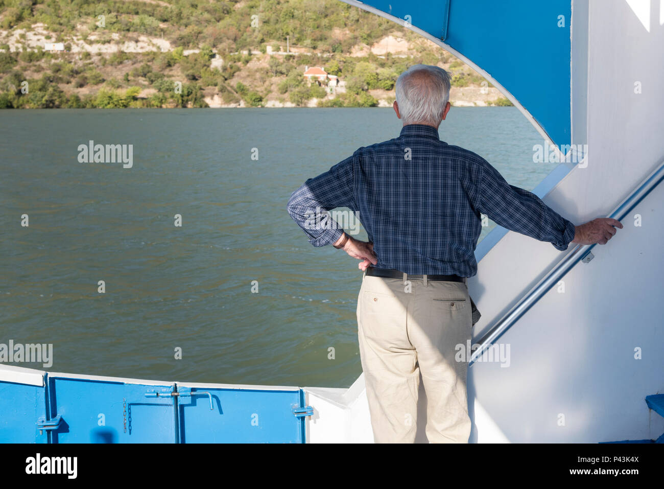 Man standing on boat hi-res stock photography and images - Alamy