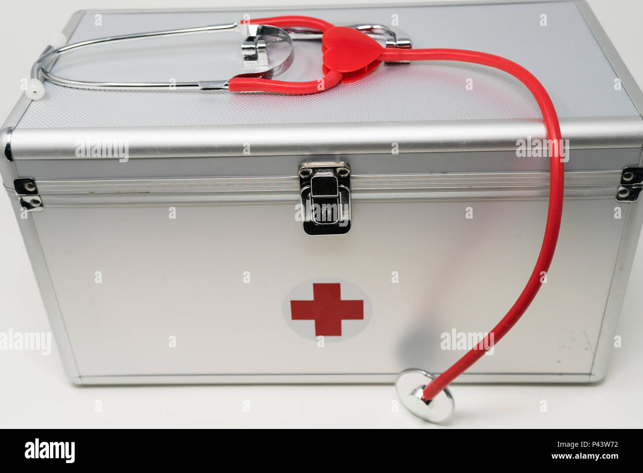 Anodised Aluminium First Aid Box with Stethoscope. Stock Photo