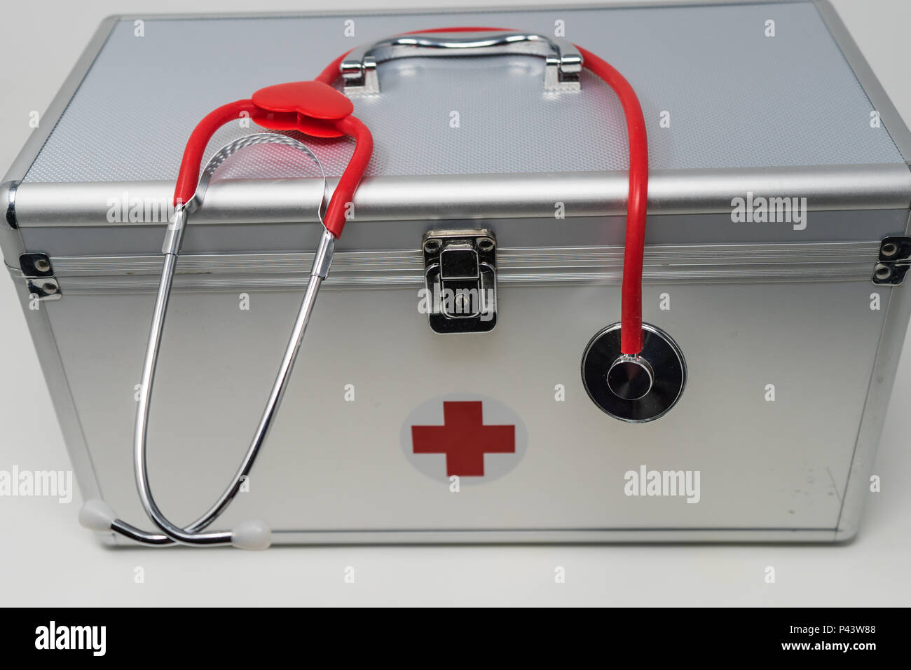 Anodised Aluminium First Aid Box with Stethoscope. Stock Photo