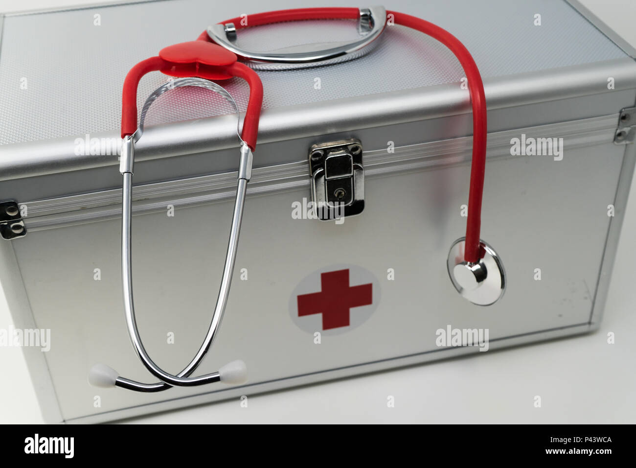 Anodised Aluminium First Aid Box with Stethoscope. Stock Photo