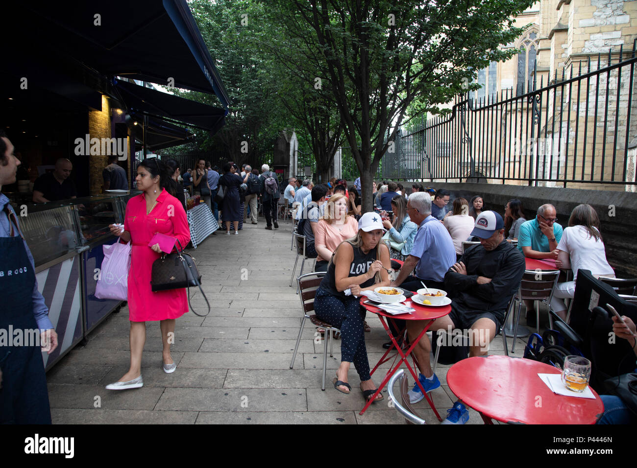 Outdoor seating at Brood restaurant in Borough Market in London, England,  United Kingdom. Borough Market is a retail food market and farmers market  in Southwark. It is one of the largest and