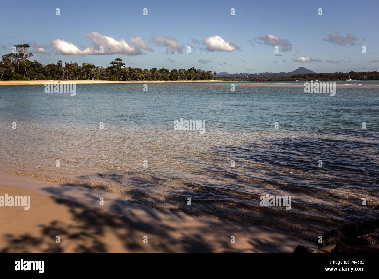 A tranquil Beach on the River Stock Photo