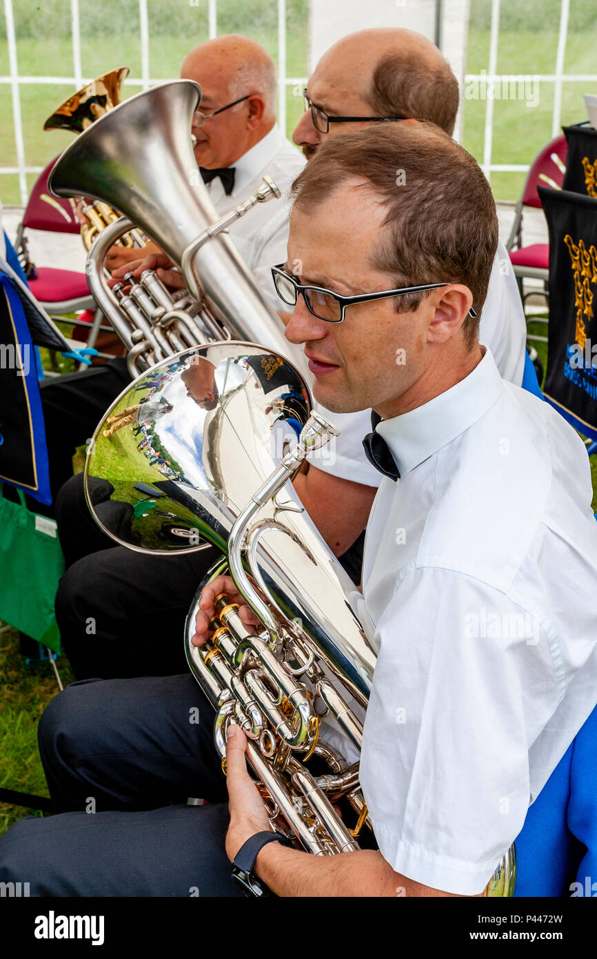 Mid Sussex Brass Band Perform At The Annual High Hurstwood Village Fete, Sussex, UK Stock Photo