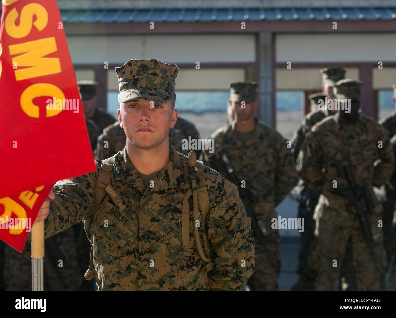 Cpl. Kyle W. Bagley stands in formation alongside U.S Marines, U.S ...