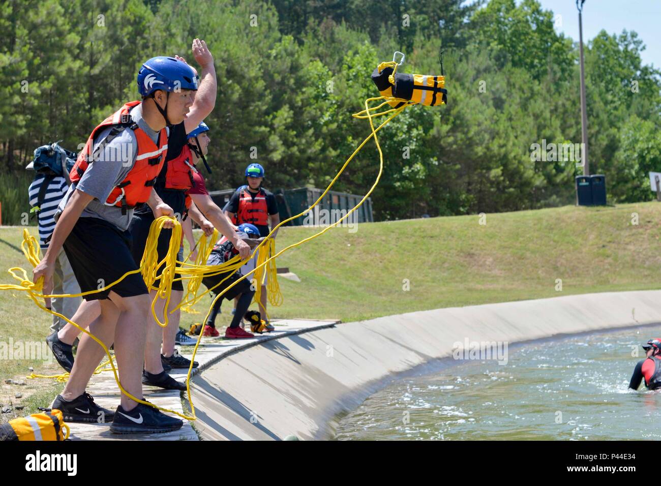 Soldiers from the North Carolina National Guard’s 105th Engineer Battalion toss ropes to