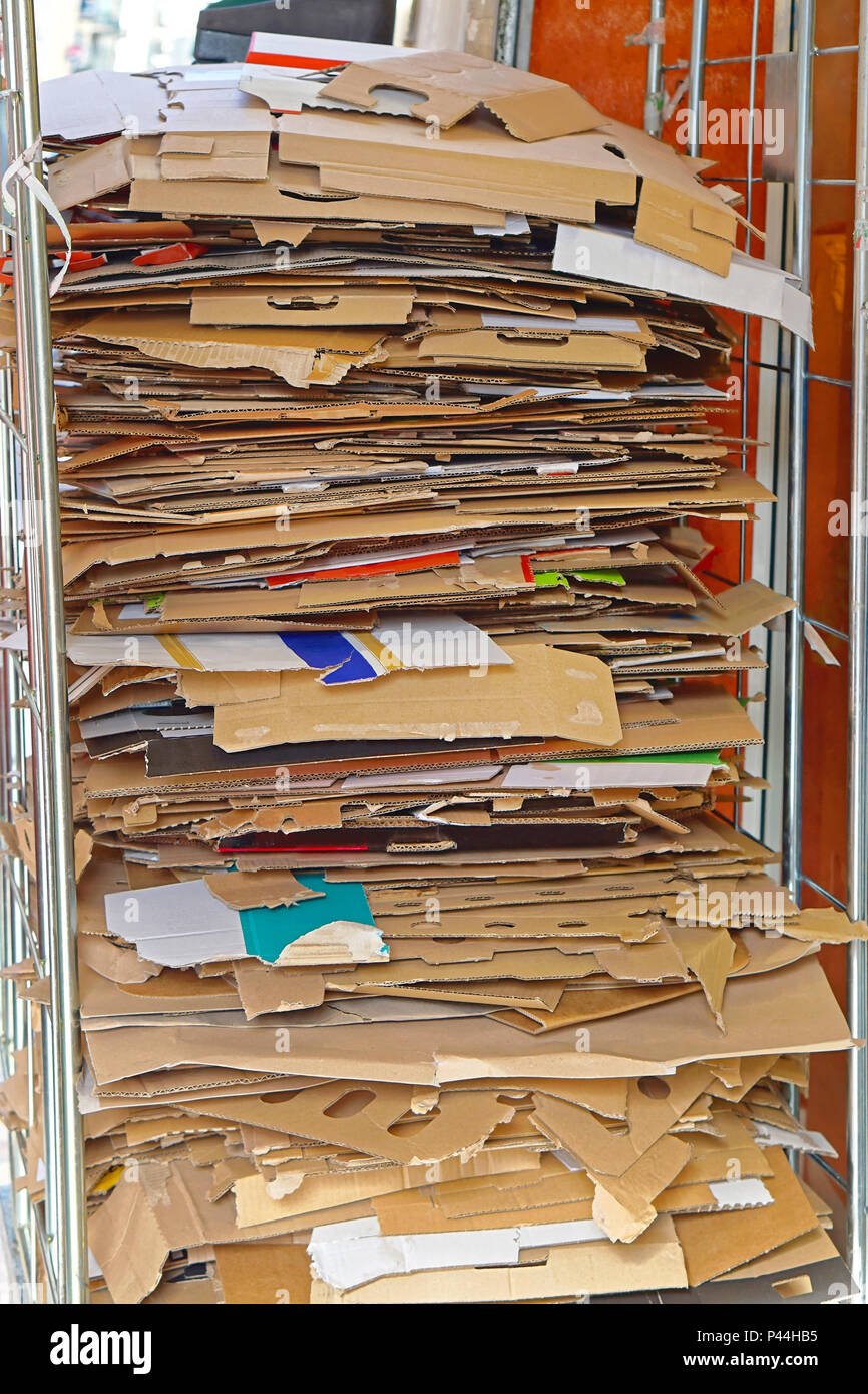 Carboard carton material stacked for recycling Stock Photo
