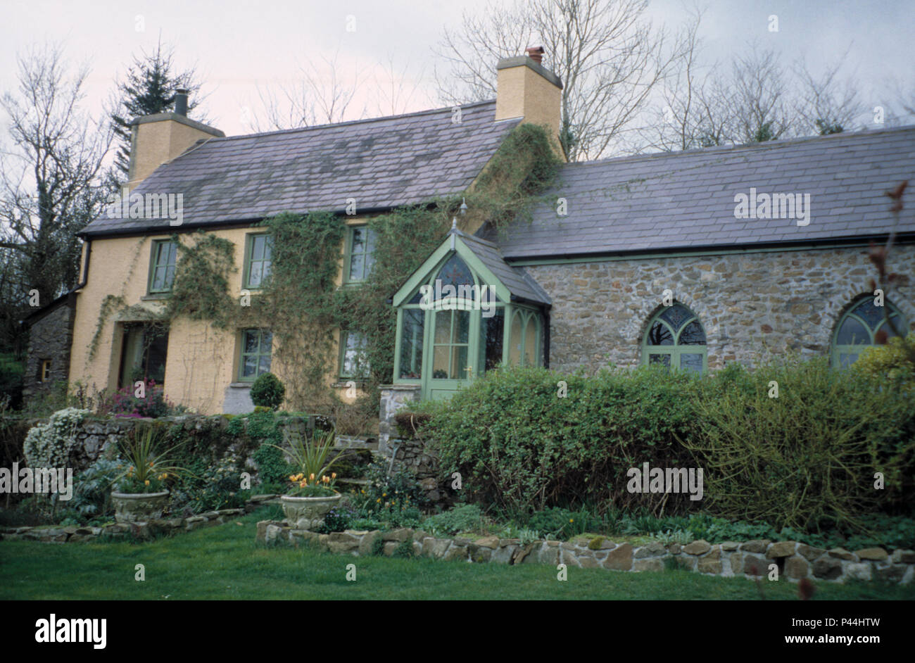 Exterior of a traditional country cottage attached to a small chapel conversion Stock Photo
