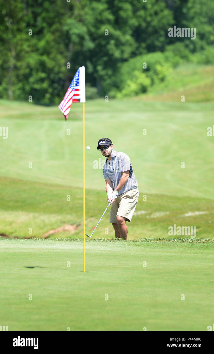Pete LeFevre make a difficult pitch shot during the 9th Annual ESPN 980 True Heroes Charity Golf Tournament to benefit the Purple Heart Foundation held at the 1757 Golf Club in Sterling,