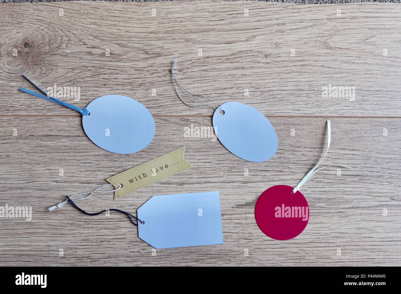 Labelling Tag With String Tagging label hi-res stock photography and images - Alamy