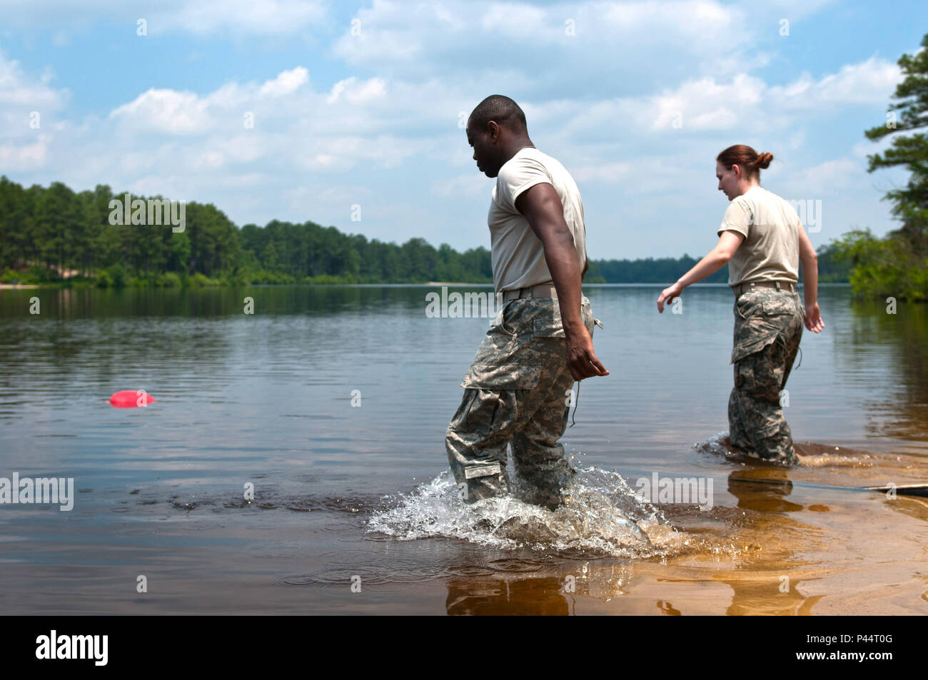 U S Army Reserve Water Treatment Specialists With The 810th Quartermaster Company Based Out Of Maineville Oh Enter Mott Lake To Secure Their Water Pump For Their Tactical Water Purification System Twps During