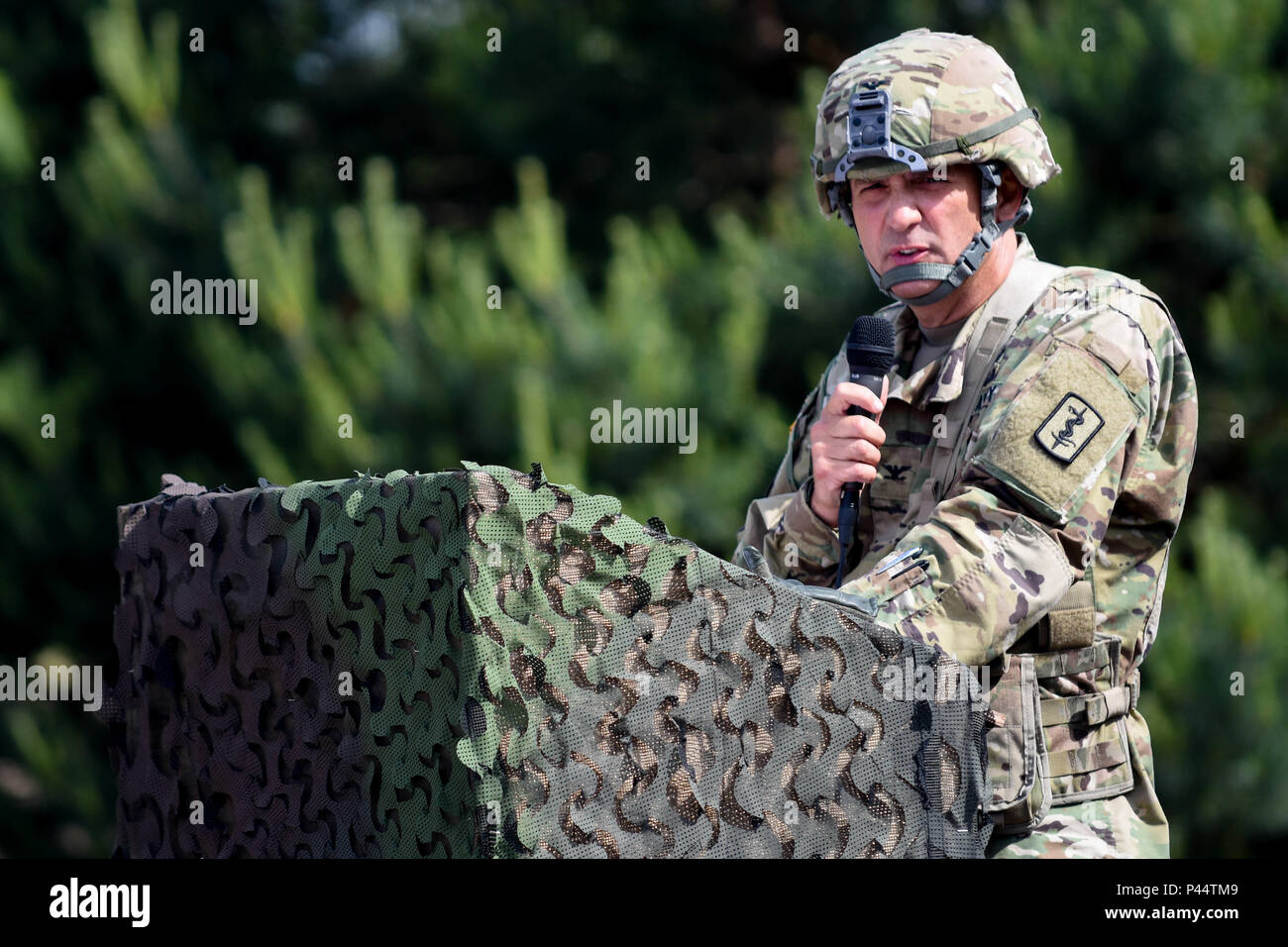 421st Medical Battalion (Multifuntional) conducts a Relinquishment of Command Ceremony in Torun, Poland during Anakonda 16, a Polish Military led exercise, on June 2. 421st MMB is providing NATO ROLE 1 and 2 support (557th Area Support Medical Company), food and water risk assessments along with base camp assessments (64th Medical Detachment VSS and 71st Medical Detachment Preventive Medicine), and behavioral health services (254th Combat Operational Stress Control) in various locations in Poland during the exercise. (U.S. Army photo by Capt. Jeku Arce, 30th Medical Brigade Public Affairs) Stock Photo