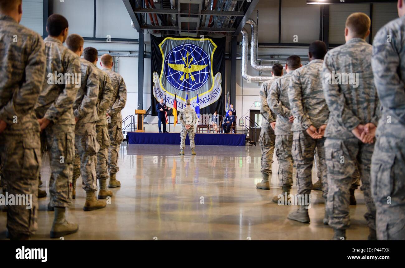 Airmen from the 521st Air Mobility Operations Wing listen to Maj. Gen. Frederick Martin, U.S. Air Force Expeditionary Center commander, at Ramstein Air Base, Germany, June 14, 2016. Martin was the presiding officer during the 521st AMOW change of command with Col. Thomas Cooper as he became the new commander. (U.S. Air Force photo/Staff Sgt. Armando A. Schwier-Morales) Stock Photo