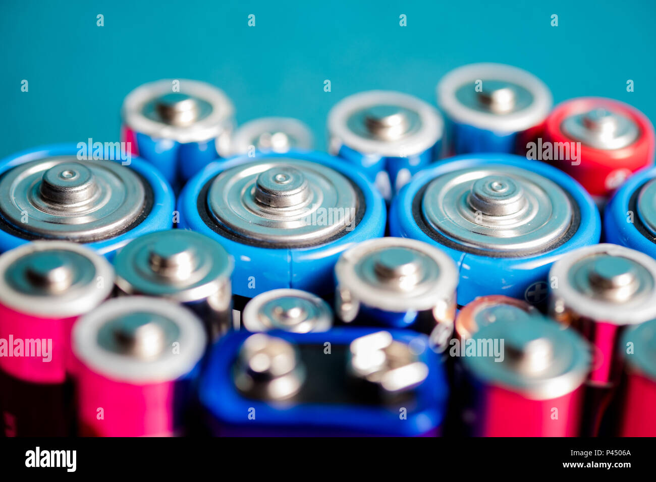 petroleum overgive Mus Ecology recycling concept. Many different types used or new battery,  rechargeable accumulator, alkaline batteries on color background. Nature  energy Stock Photo - Alamy