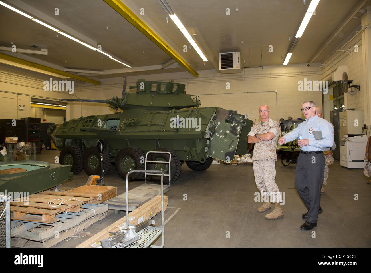 Chip Schwartz, Production Plant Barstow Plant Manager, points out the