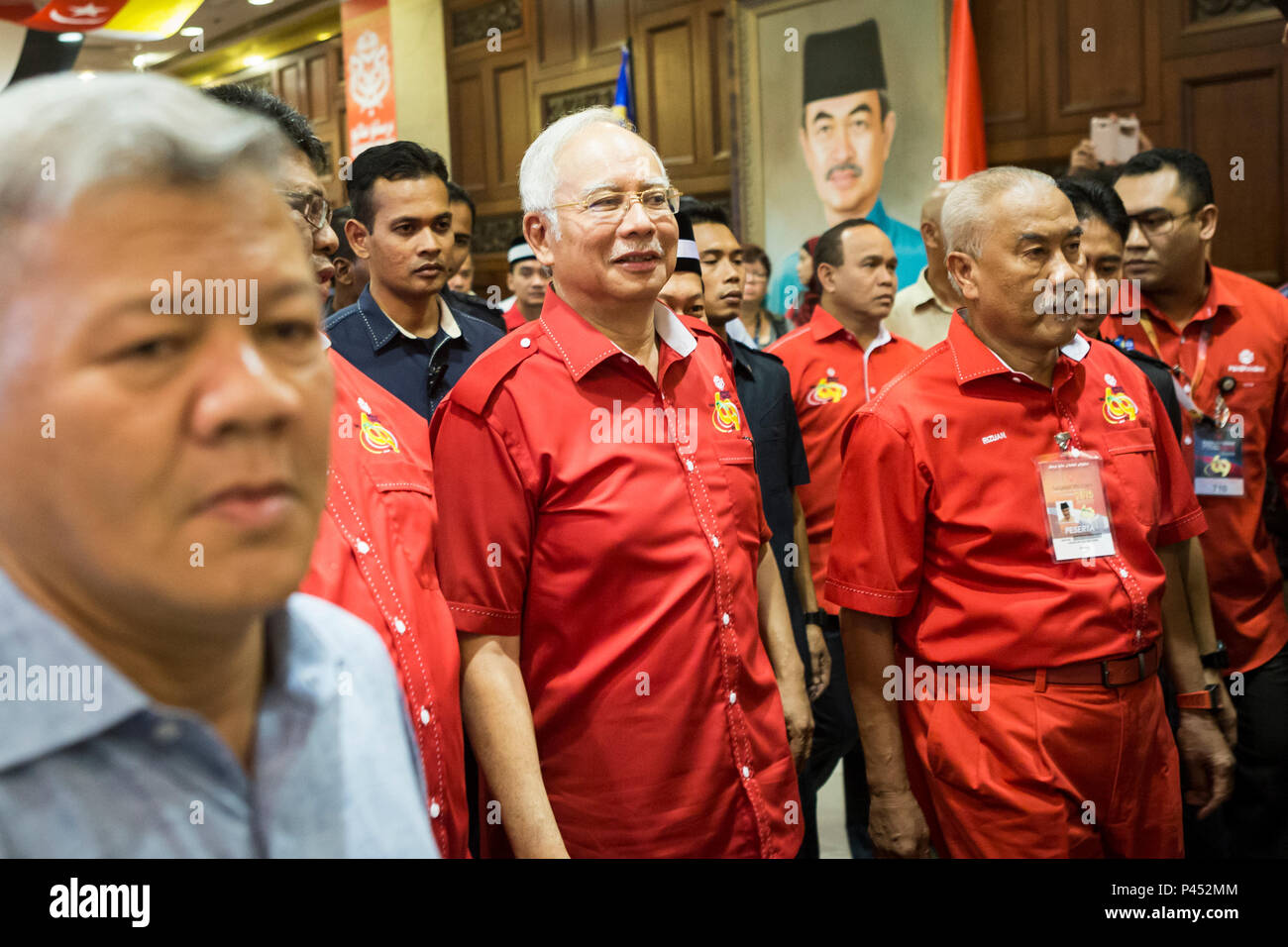 Najib Razak (c), Malaysia's former Prime Minister, arrives at the United Malays National Organisation General Assembly (UMNO) General Assembly at the Putra World Trade Center (PWTC) in Kuala Lumpur, Malaysia, on Tuesday, Dec. 8, 2015. Stock Photo