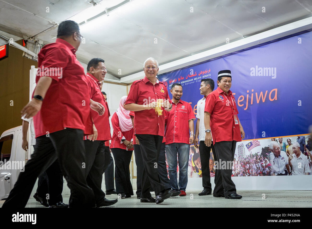 Najib Razak (c), Malaysia's former Prime Minister, arrives at the United Malays National Organisation General Assembly (UMNO) General Assembly at the Putra World Trade Center (PWTC) in Kuala Lumpur, Malaysia, on Tuesday, Dec. 8, 2015. Stock Photo
