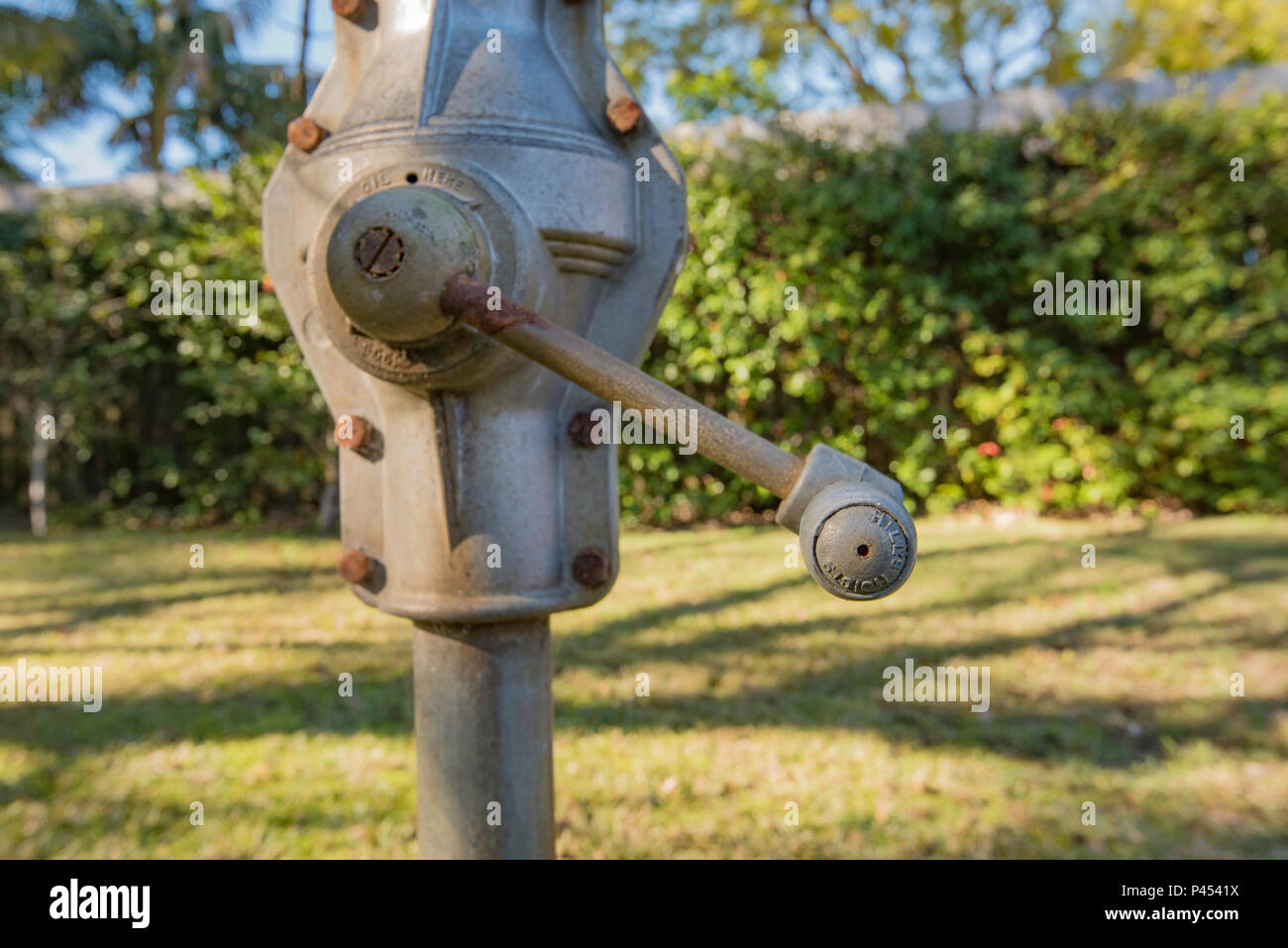 The winding mechanism of a Hills Hoist clothes drying line in an Australian backyard Stock Photo