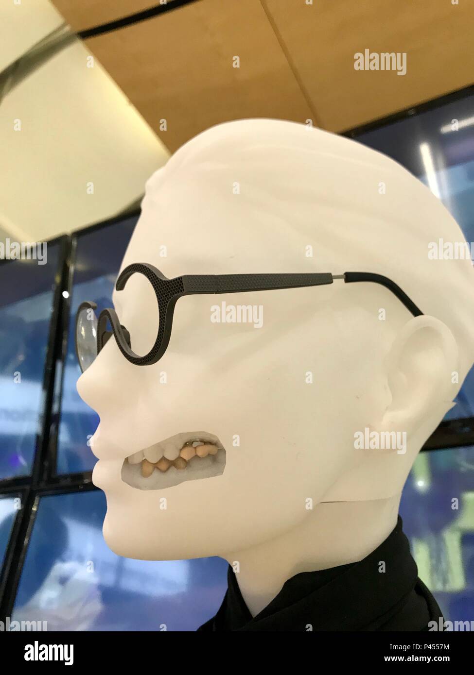 Hannover, Germany - April 2018: 3D printed temporary crown and bridge (teeth) in composite by GC Europe at the FLAM3D booth at Hannover Messe Stock Photo
