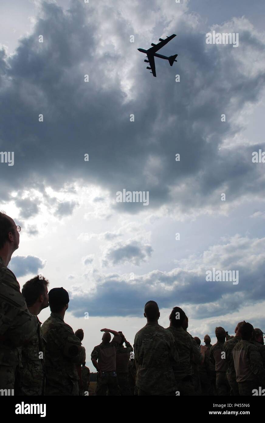 Multinational Troops Watch As A U S B 52 Flies Over Rukla Lithuania Multinational troops watch as a u s b 52 flies over rukla lithuania