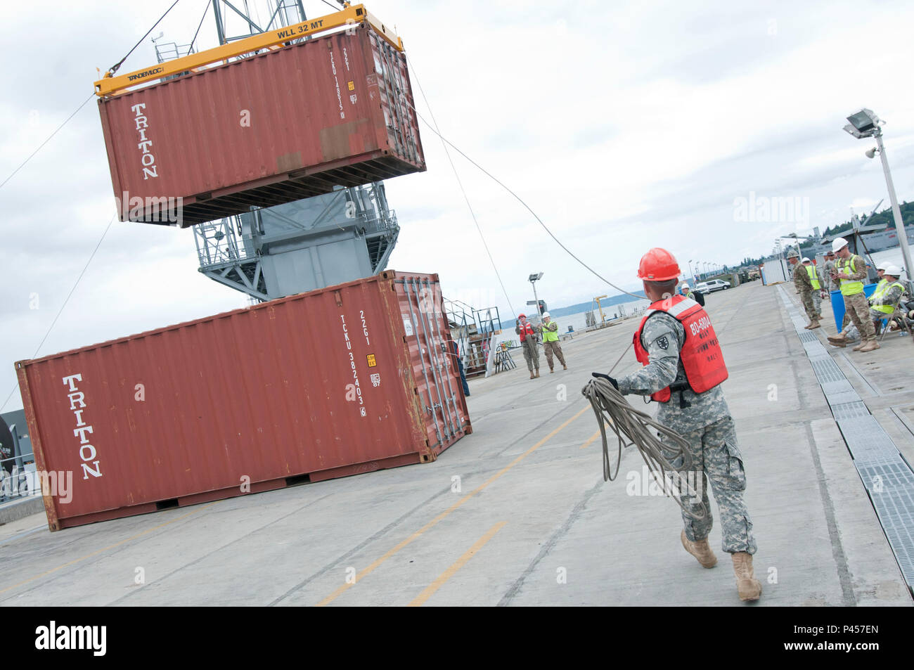 Soldiers from the 11th Transportation Battalion assist on the ...