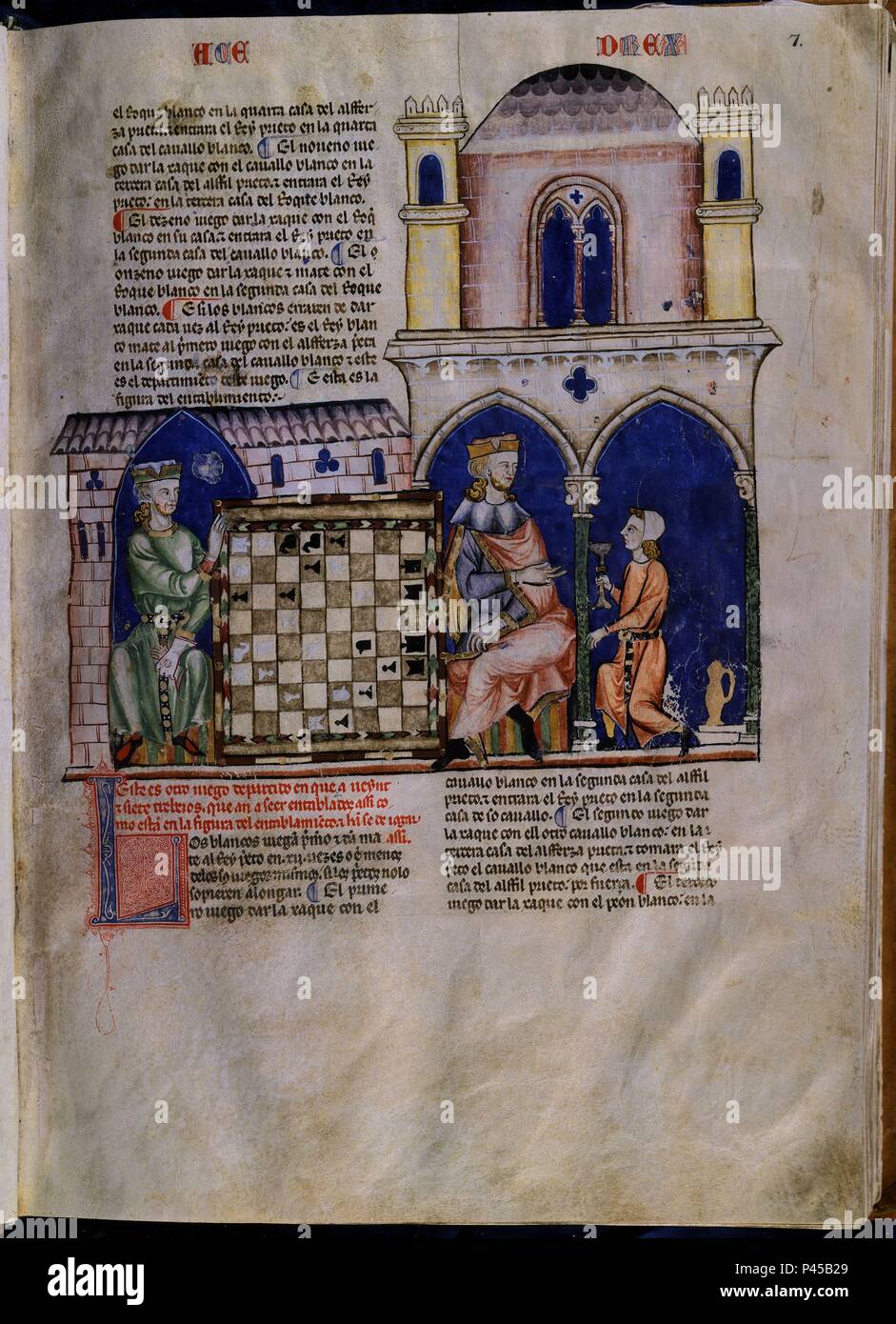 LIBRO DE JUEGOS O LIBRO DEL AJEDREZ DADOS Y TABLAS - 1283 - FOLIO 7R - DOS JUGADORES EN EL INTERIOR DE UNA CASA NOBLE CON UN CRIADO SIRVIENDO. Author: Alfonso X of Castile the Wise (1221-1284). Location: MONASTERIO-BIBLIOTECA-COLECCION, SAN LORENZO DEL ESCORIAL, MADRID, SPAIN. Stock Photo