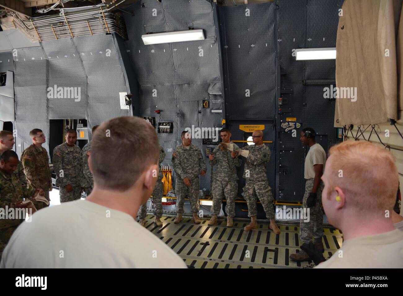 Soldiers from the 1397 Deployment and Distribution Support Battalion receive training from Air Force Reserve aerial porters June 18, 2016, on how to properly secure vehicles on the C-5 Galaxy.  (U.S. Air Force photos/Staff Sgt. Madelyn Brown) Stock Photo