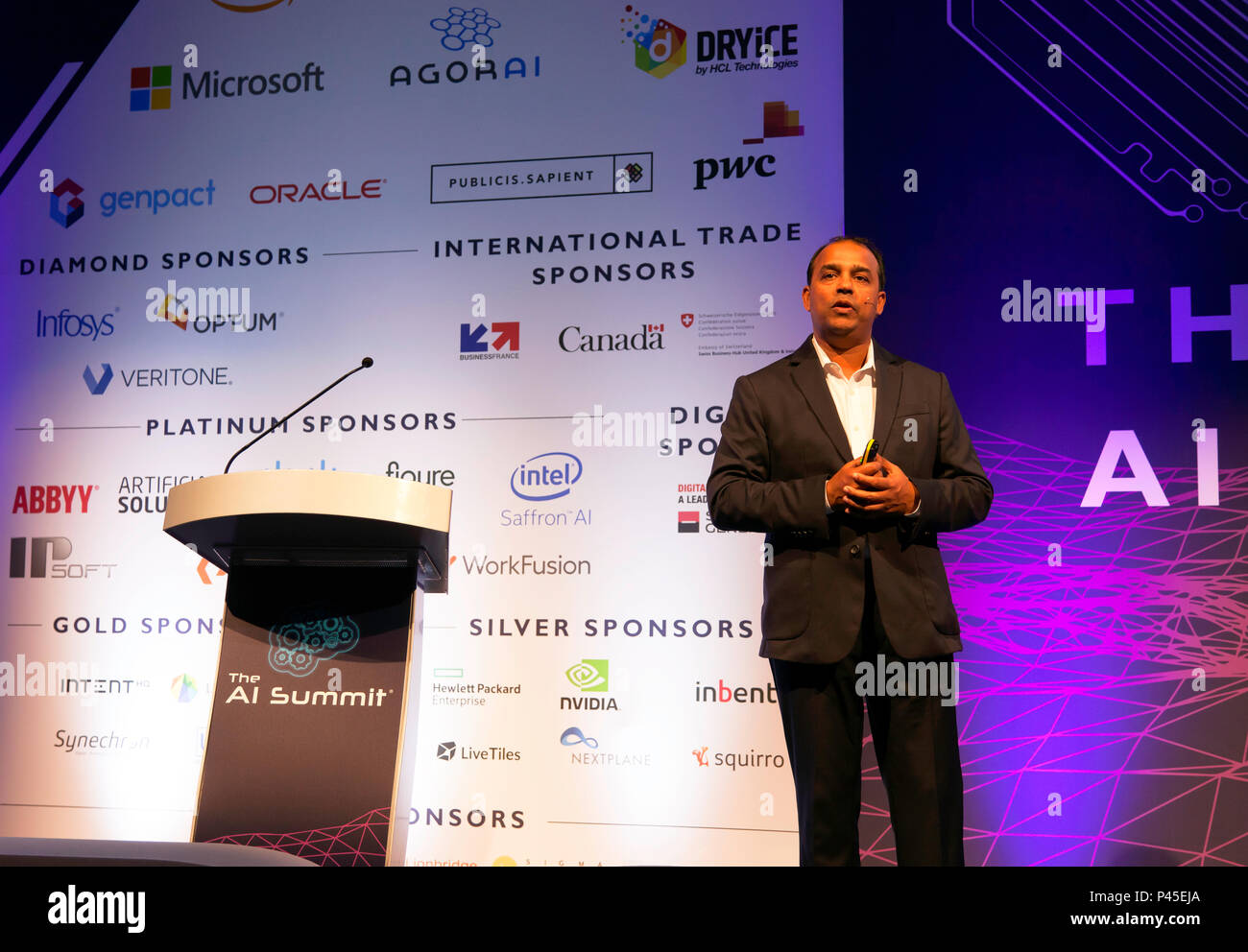Amit Gupta, SVP and Global GTH Head of DRYiCE, giving a lecture entitled 'Assuring Digital Transformation  with the power of AI, at the AI Summit 2018 Stock Photo