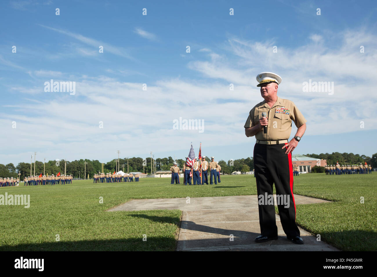 U.S. Marine Corps Maj. Gen. Walter L. Miller Jr. (right), commanding general, II Marine Expeditionary Force, gives his remarks during a retirement ceremony for Marine Corps Installations East, Marine Corps Base Camp Lejeune, on William Pendleton Thompson Hill Field, Camp Lejeune, June 9, 2016. Berry retired after 30 years of honorable and faithful service. (U.S. Marine Corps photo by Lance Cpl. Careaf L. Henson, MCIEAST Combat Camera/Released) Stock Photo