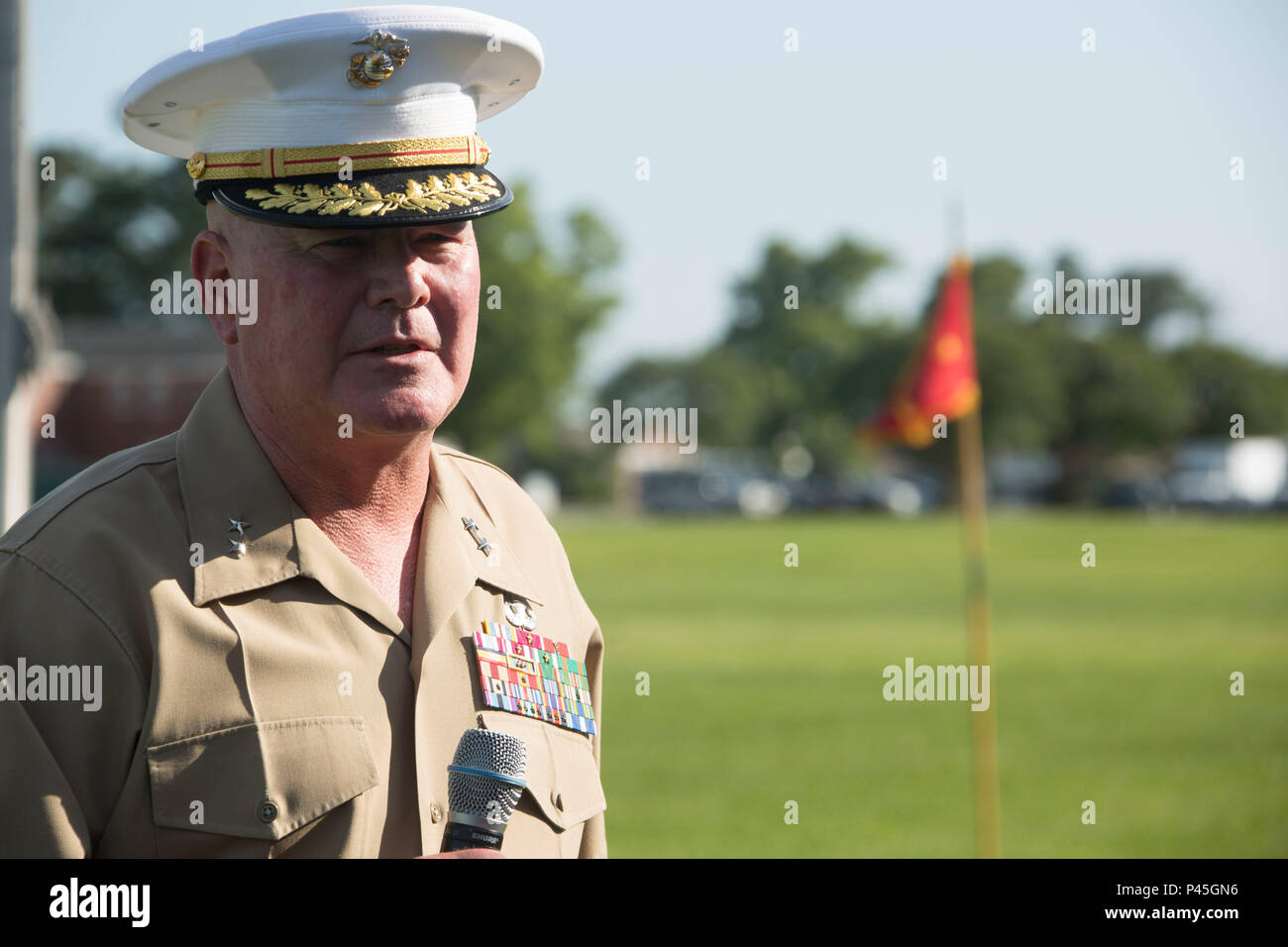 U.S. Marine Corps Maj. Gen. Walter L. Miller Jr. (right), commanding general, II Marine Expeditionary Force, gives his remarks during a retirement ceremony for Marine Corps Installations East, Marine Corps Base Camp Lejeune, on William Pendleton Thompson Hill Field, Camp Lejeune, June 9, 2016. Berry retired after 30 years of honorable and faithful service. (U.S. Marine Corps photo by Lance Cpl. Careaf L. Henson, MCIEAST Combat Camera/Released) Stock Photo