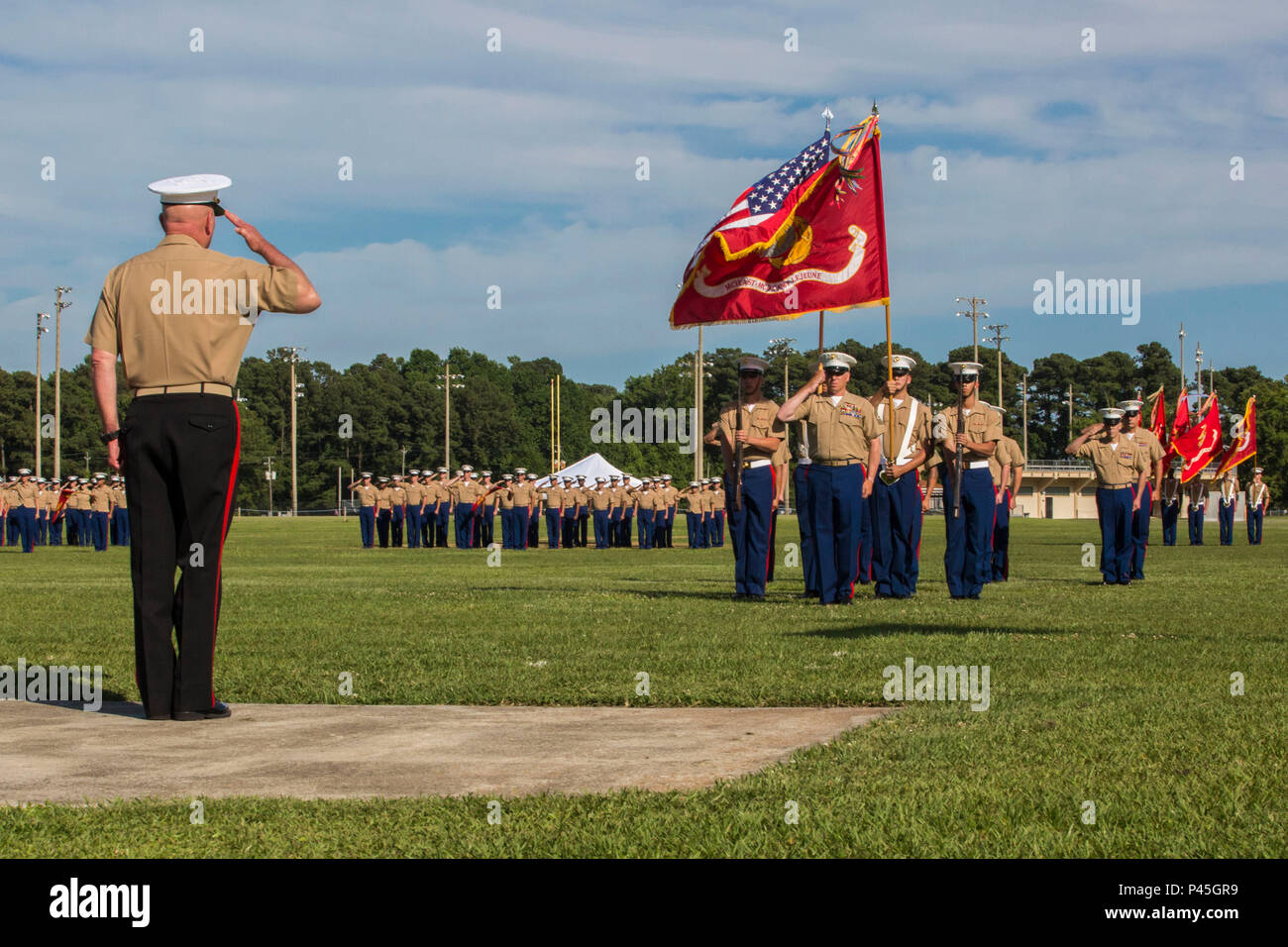 U.S. Marine Corps Maj. Gen. Walter L. Miller Jr., commanding general, II Marine Expeditionary Force, salutes the colors during Sgt. Maj. Paul A. Berry's retirement ceremony, William Pendleton Thomas Hill Field, June 9, 2016. Berry retired after 30 years of honorable and faithul service. (U.S. Marine Corps photo by Lance Cpl. Judith L. Harter, MCIEAST Combat Camera/Released) Stock Photo