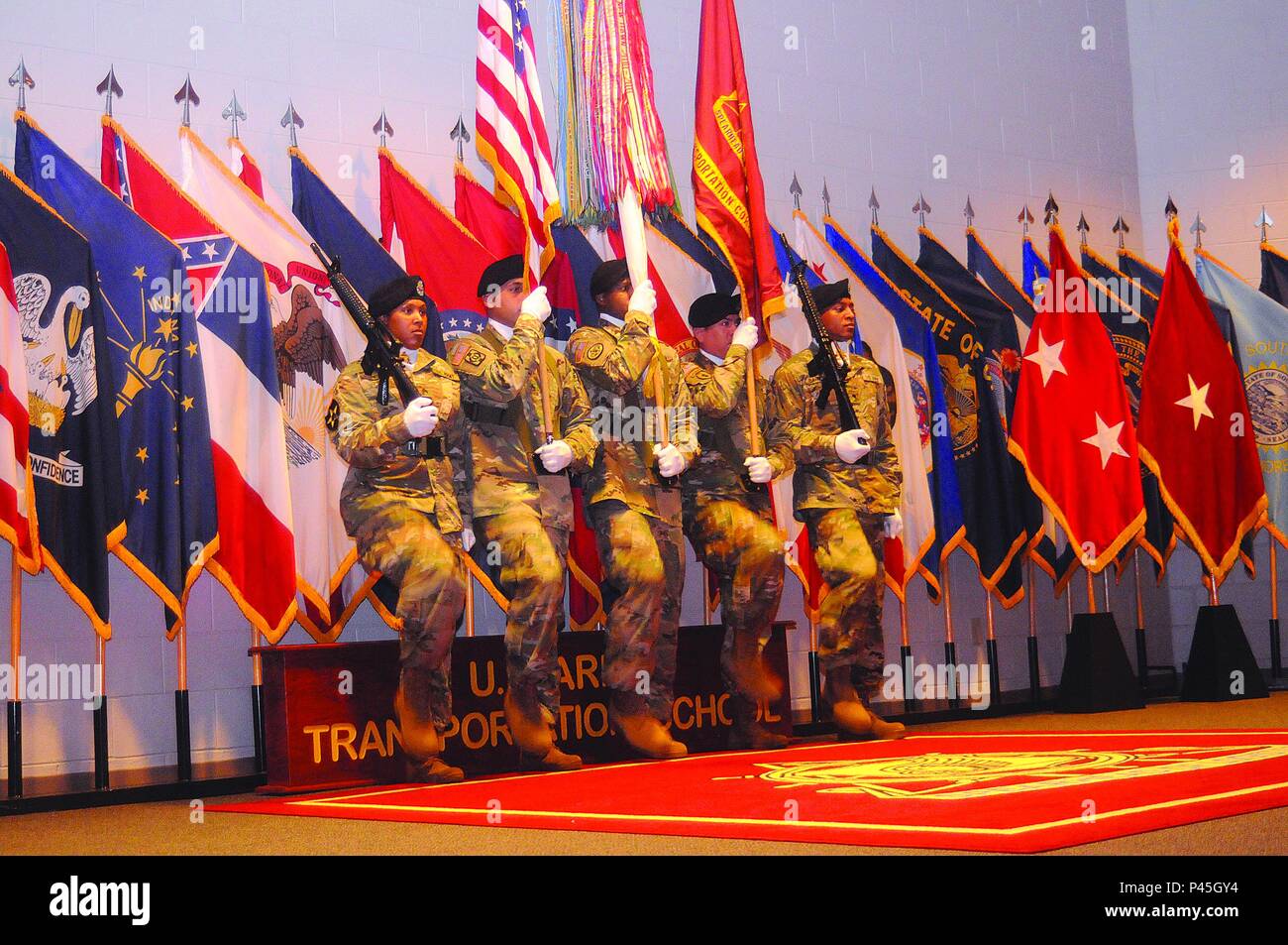 The color guard performs marching movements during a relinquishment of command ceremony June 27