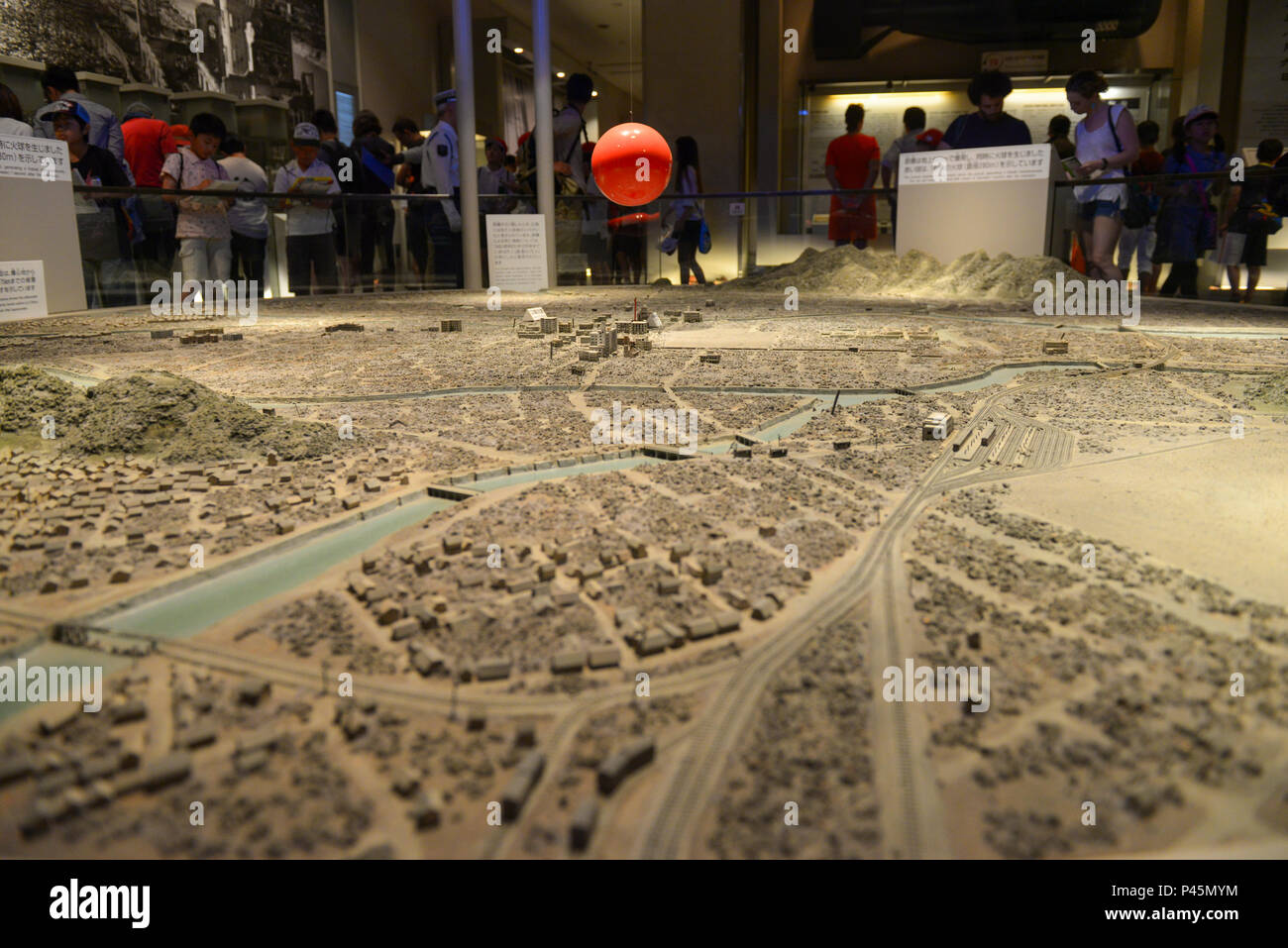 A model exhibits the detonation point and resulting destruction of the ...