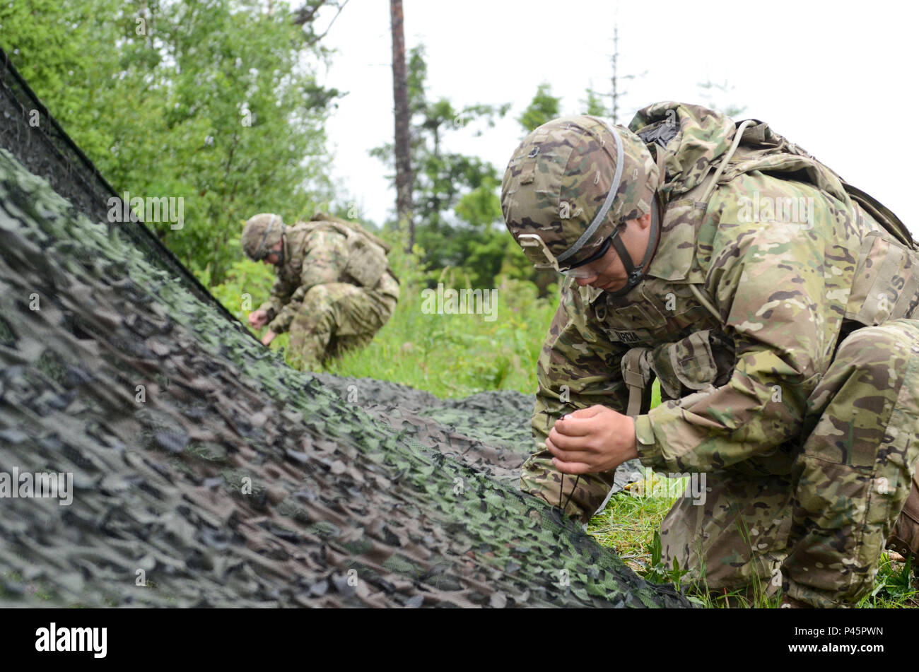 U.S. Army Pvt. Christian Garcia, a radar operator (foreground), and Spc