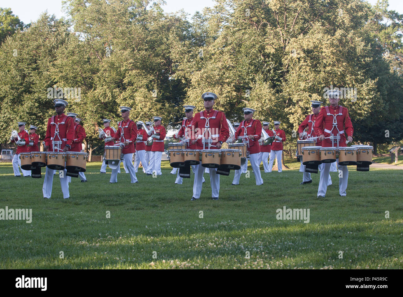 U.S. Marines with the Marine Corps Drum and Bugle Corps perform during