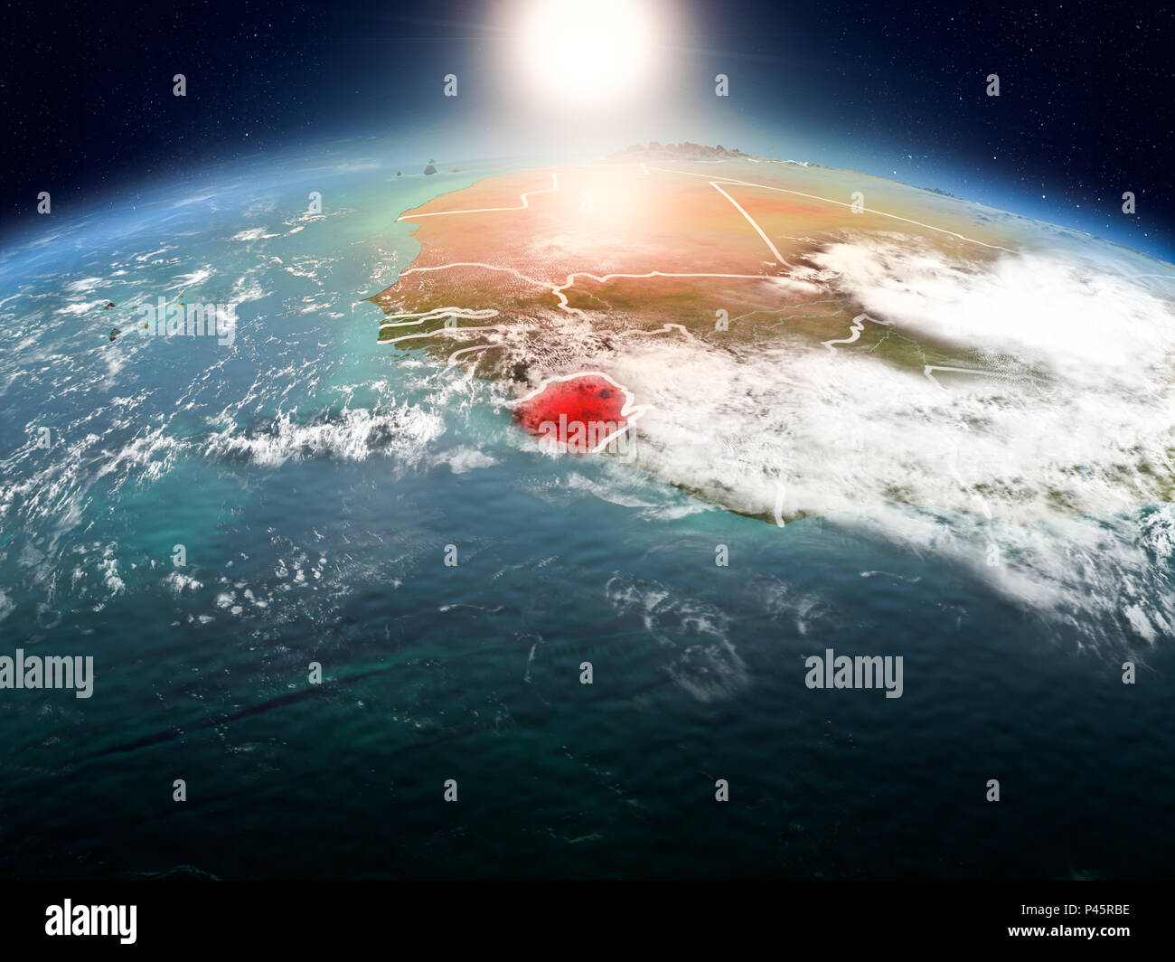 Sunrise above Sierra Leone highlighted in red on model of planet Earth ...