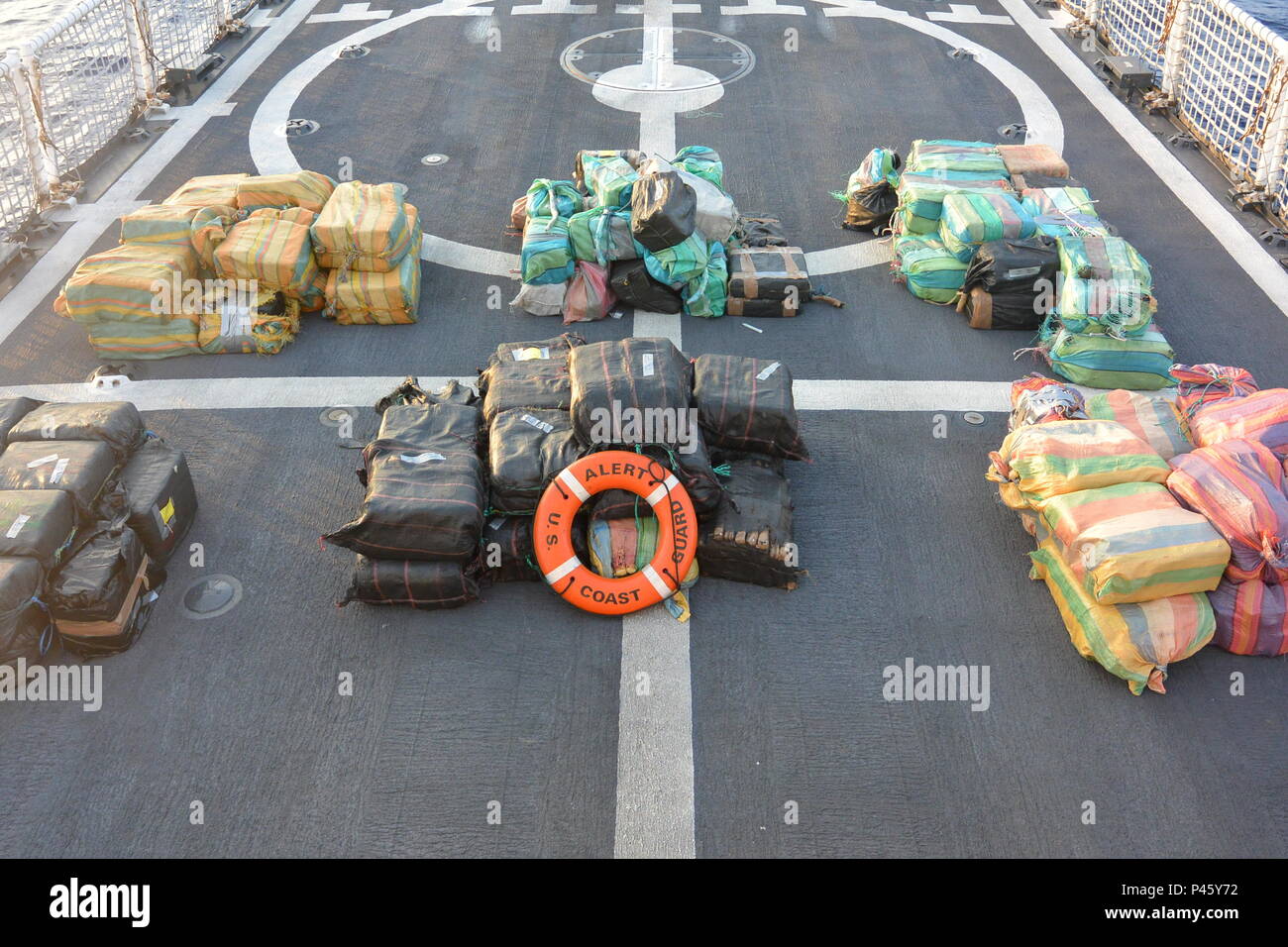 Cutter Alert had a record seizure of 3.3 tons of cocaine neatly piled on the flight deck during its 53-day counter-drug patrol that spanned 12,500 miles in the Eastern Pacific. These counter-drug interdictions in the Western Hemisphere Transit Zone off the coasts of South and Central America, were carried out in support of Operation Martillo, an international operation focused on sharing information and bringing together air, land, and maritime assets from the U.S. Department of Defense, the Department of Homeland Security, and Western Hemisphere and European partner nation agencies to counter Stock Photo