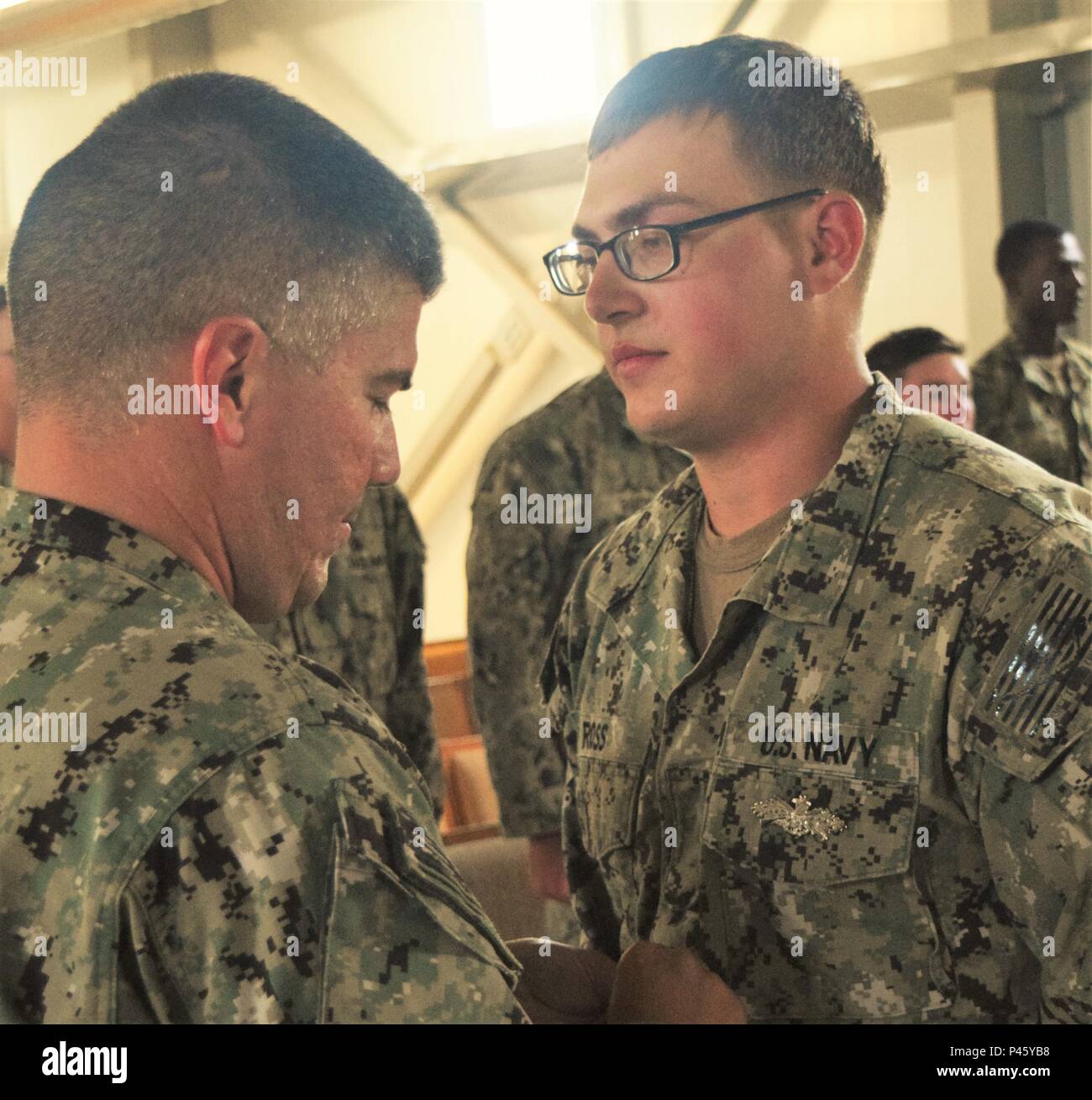 Builder Constructionman Jordan Ross receives a promotion from receives ...