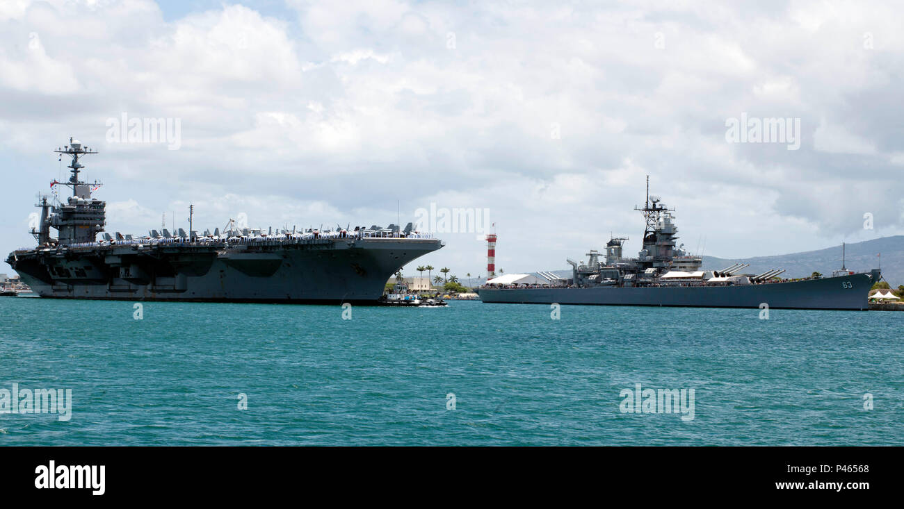 160629-N-ON468-106  PEARL HARBOR (June 29, 2016) The aircraft carrier USS John C. Stennis (CVN 74) arrives at Joint Base Pearl Harbor-Hickam for Rim of the Pacific (RIMPAC) 2016. John C. Stennis is currently on a Western Pacific deployment and is expected to play a major role in RIMPAC. Twenty-six nations, more than 40 ships and submarines, more than 200 aircraft and 25,000 personnel are participating in RIMPAC from June 30 to Aug. 4, in and around the Hawaiian Islands and Southern California. The world&#39;s largest international maritime exercise, RIMPAC provides a unique training opportunit Stock Photo