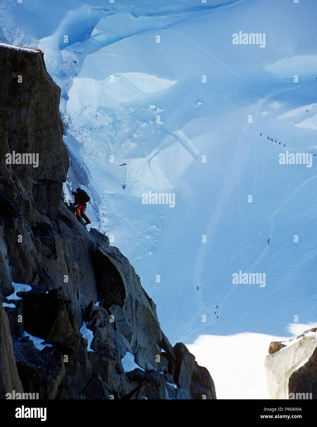Climbers on the Cosmiques Arête of the Aiguille du Midi in the French Alps, Chamonix Stock Photo