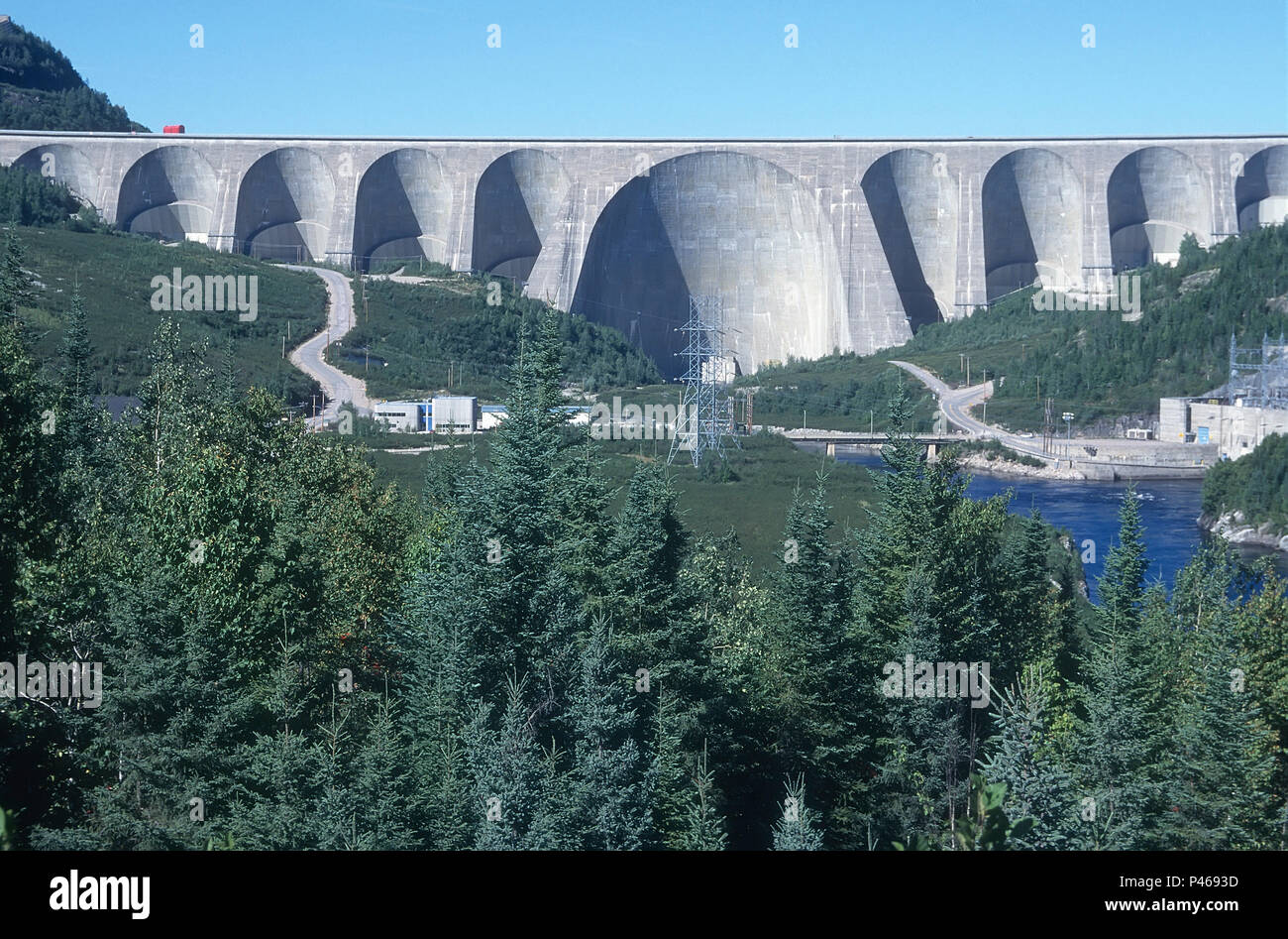 The massive Daniel Johnson Dam, also known as manic 5, on the Manicougan river in Quebec Canada. It is the largest dam of its type in the world Stock Photo