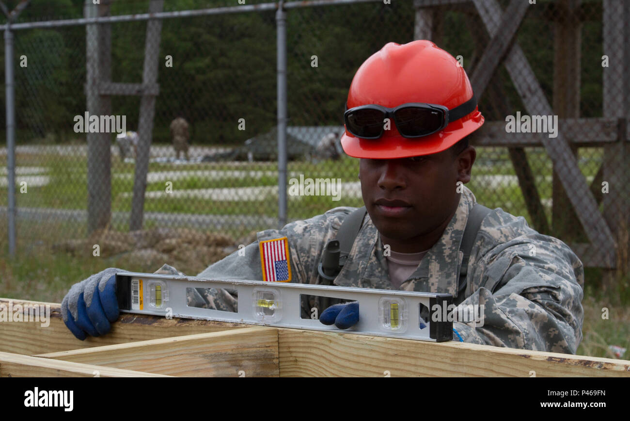 A Soldier from the 412th Engineer Company, U.S. Army Reserve, checks ...