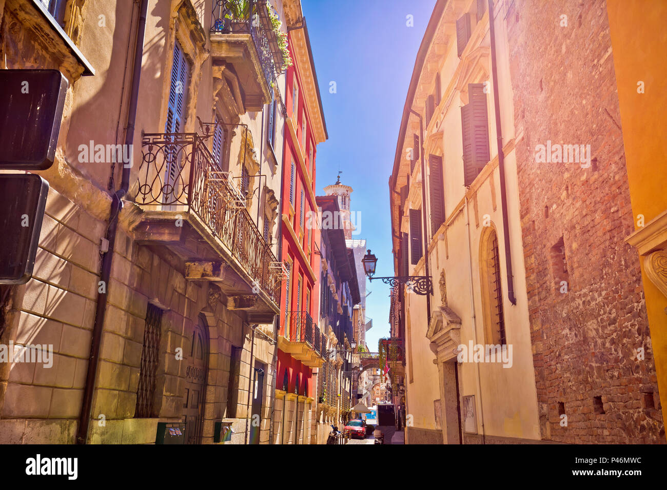 Colorful street of Verona in sun haze view, Vento region of Italy Stock Photo