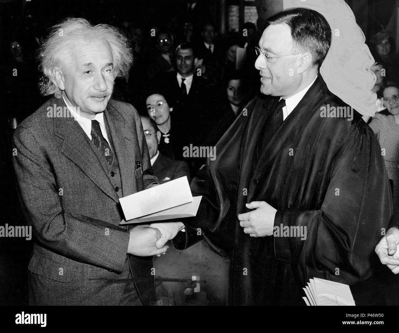 Albert Einstein receiving certificate of American citizenship from Judge Phillip Forman Stock Photo