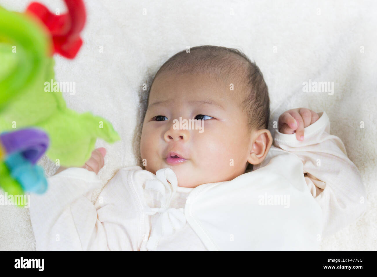 Close Up Two Month Old New Born Asian Cute Baby Playing On Play Gym Toy White Bed Background Selection Focus Stock Photo Alamy