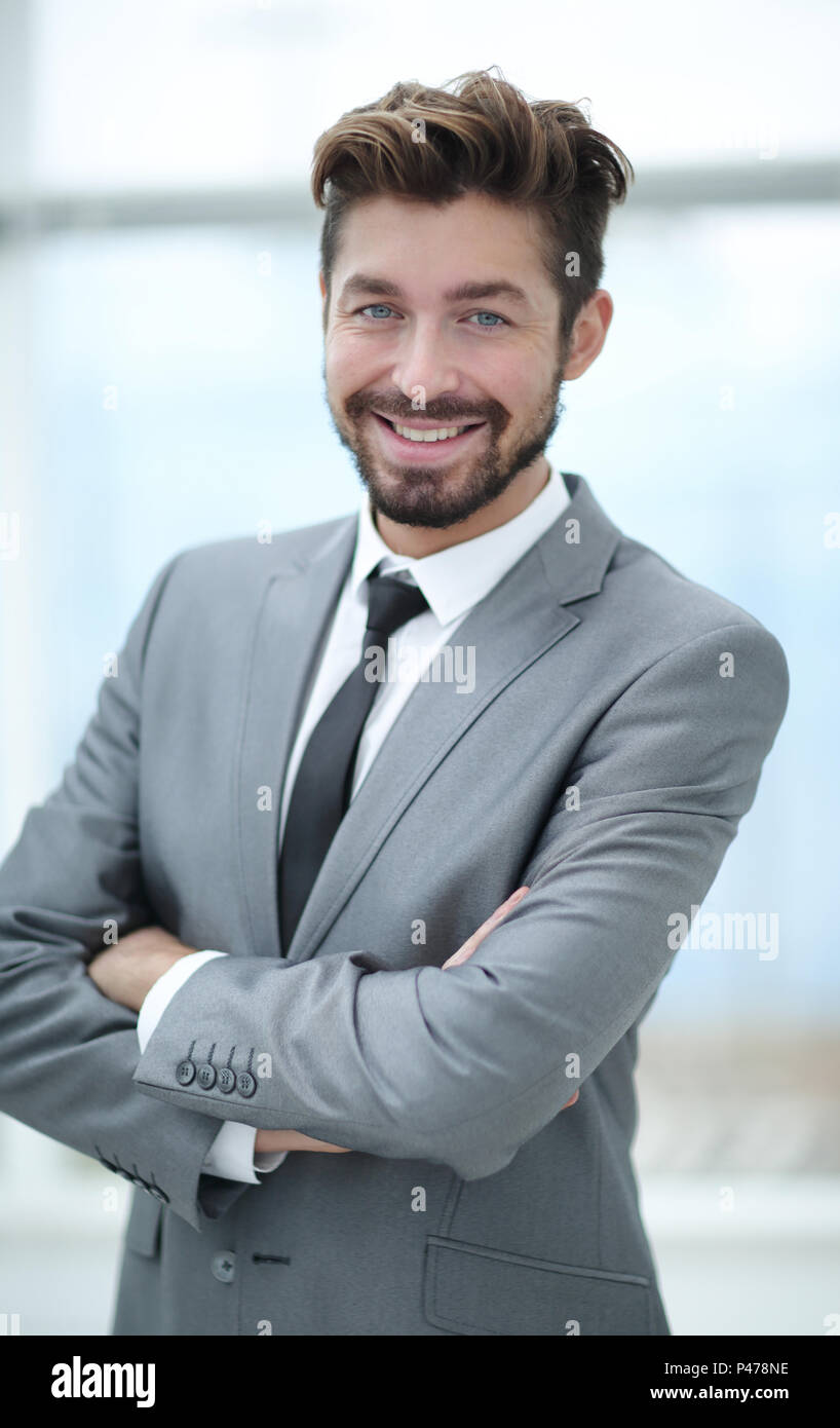 A young man in a gray suit Stock Photo - Alamy