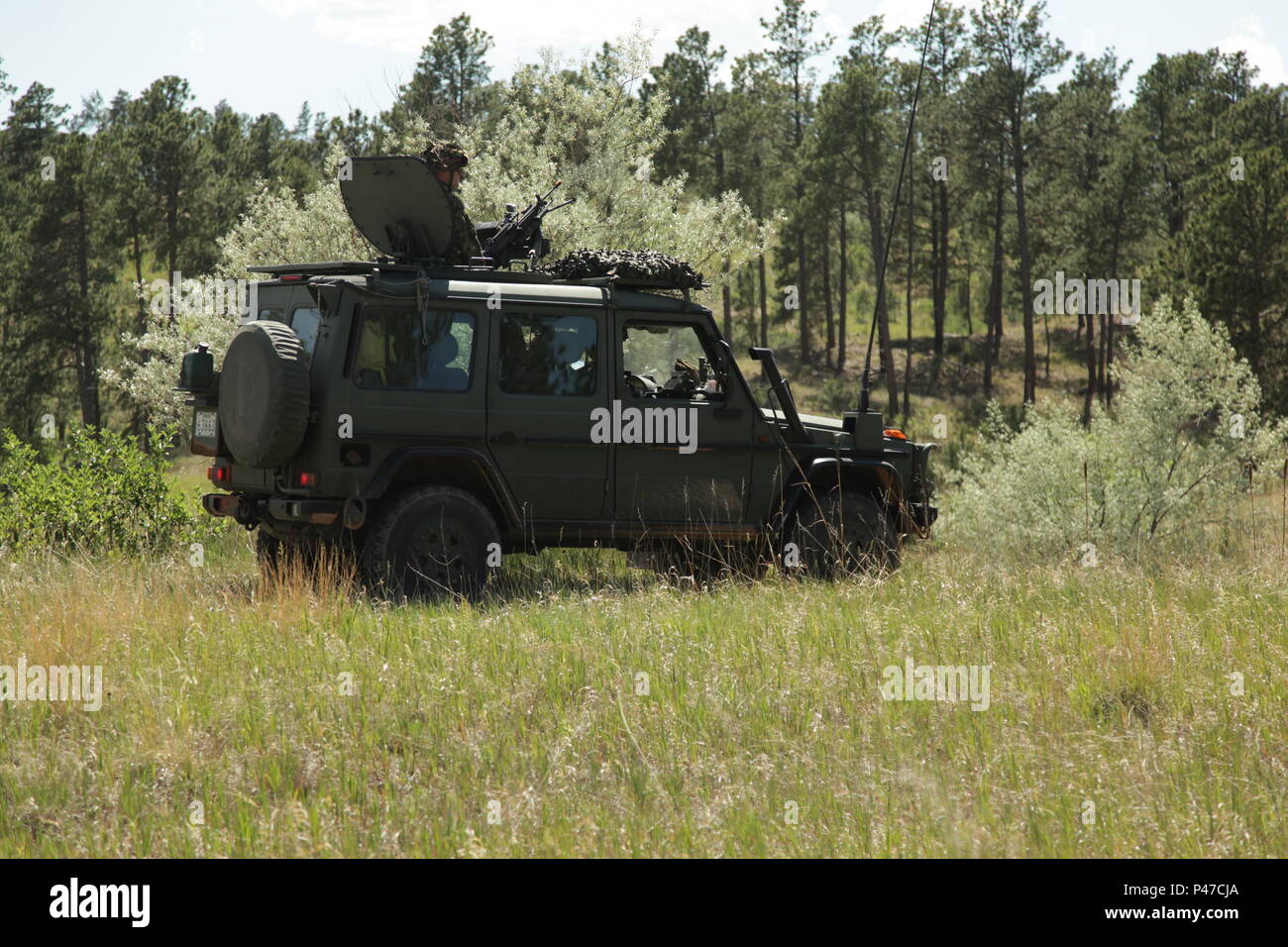 A Canadian G-Wagon from the King's Own Calgary Regiment, assumes a firing  position as a convoy is stopped at the counter improvised explosive device training  course on West Camp Rapid, as part